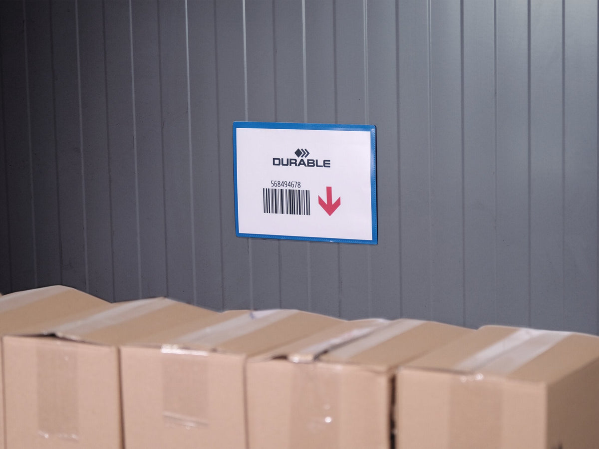 Durable A5 landscape magnetic pouch with a small barcode label on a grey metal wall above cartons