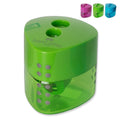 Faber-Castell Grip double hole pencil sharpener in green with two holes, raised grey grip dots and translucent shavings reservoir, with pink and blue versions shown