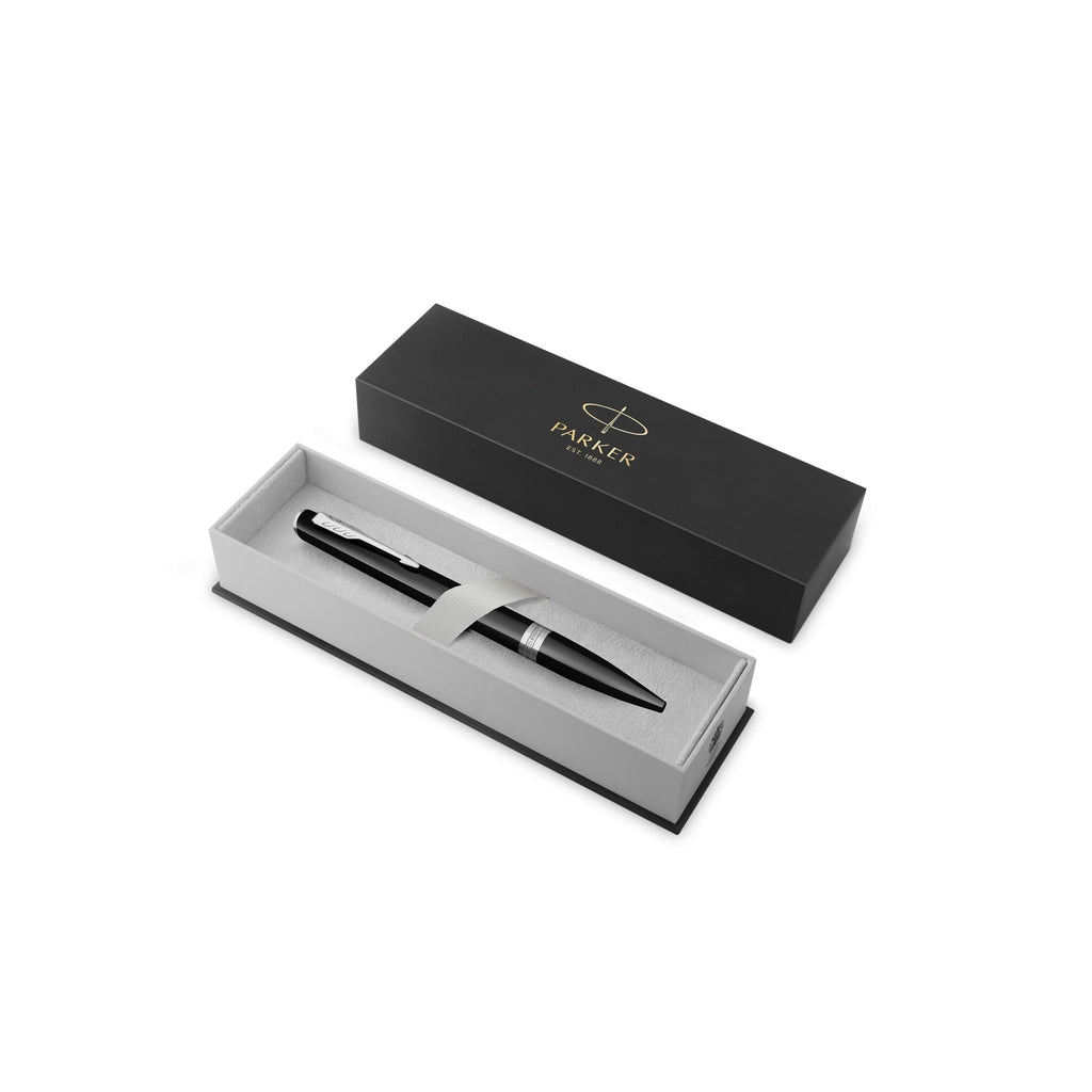 Black Meridian ballpoint resting in an open black Parker gift box with a grey insert, lid standing behind