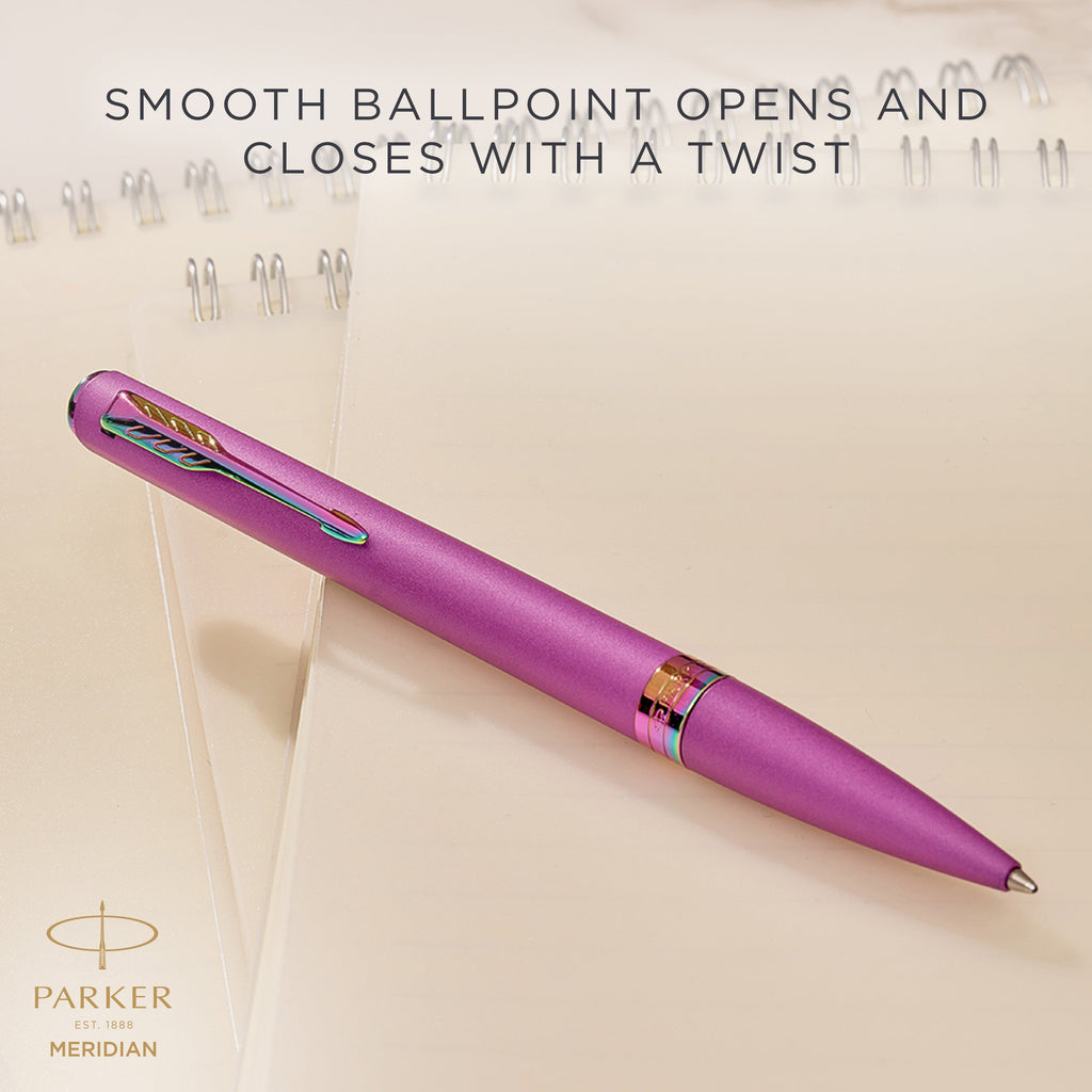 Grape Meridian ballpoint resting on a desk, with Parker's caption that the smooth ballpoint opens and closes with a twist