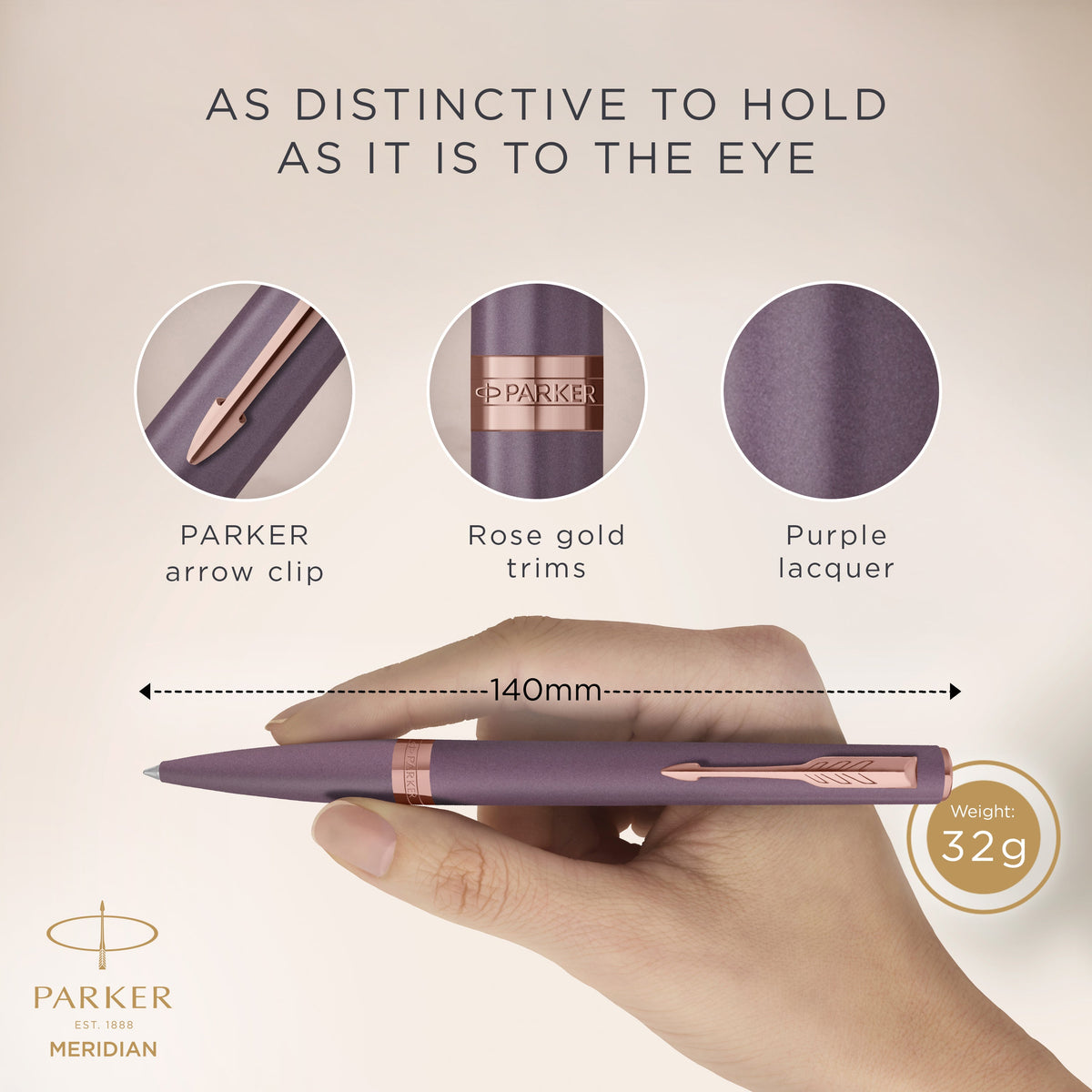 Hand holding the purple Meridian ballpoint with close-ups of the PARKER arrow clip, pink gold trims and purple lacquer, marked 140 mm long and 32 g